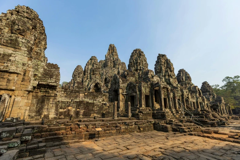 large stone structures in an open area under a clear blue sky