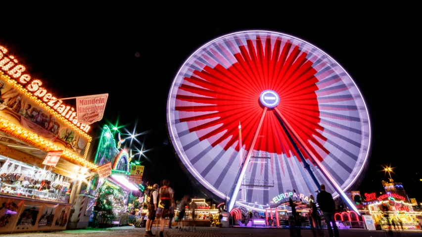 this is the ferris wheel at christmas time in an amut park