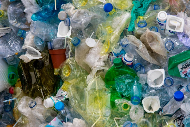 a pile of various plastic bottles and other items