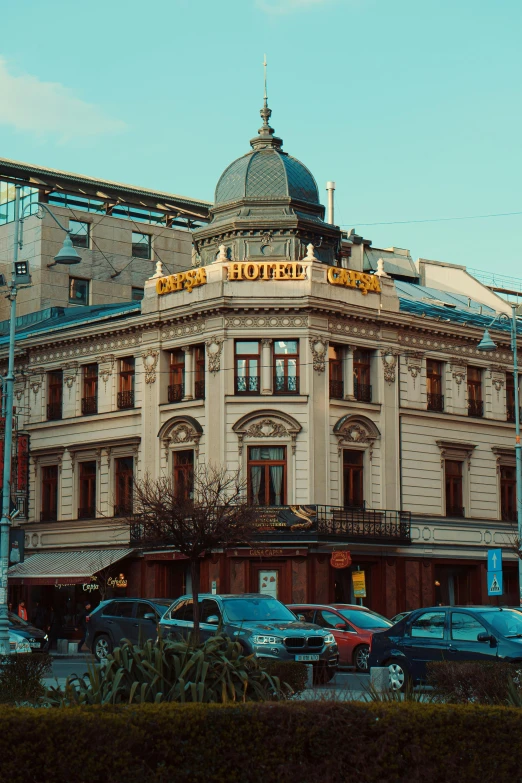 old theater building next to street in urban area