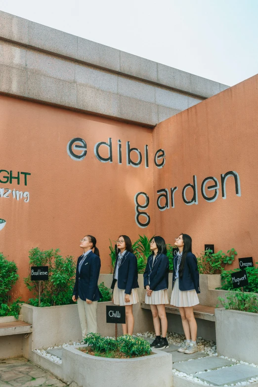 a group of people standing in front of a building