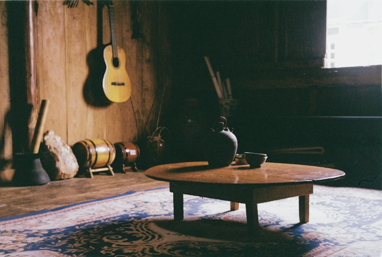 a room with musical instruments and a coffee table