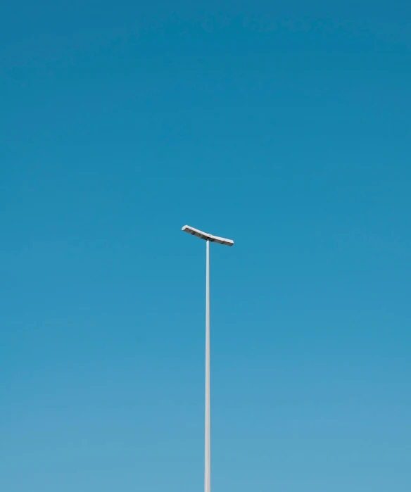 the two lights are mounted to the poles
