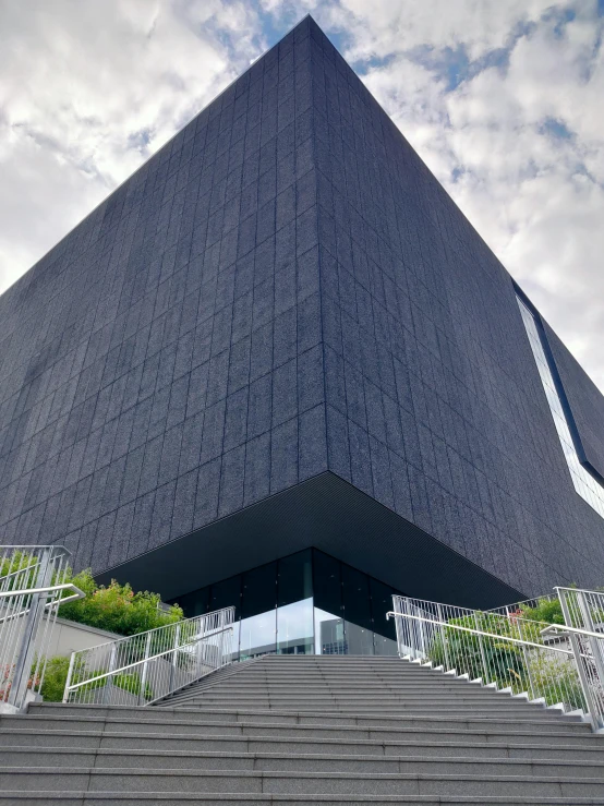 a group of stairs going down into a large building