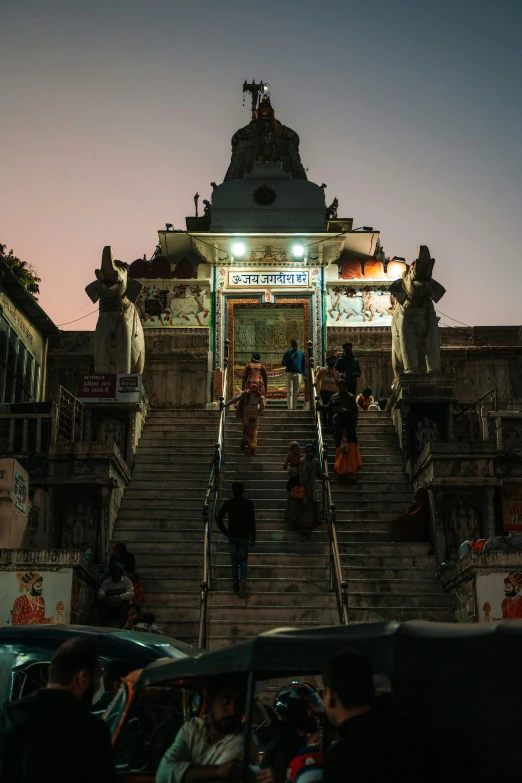 the steps lead down to the entrance of a building