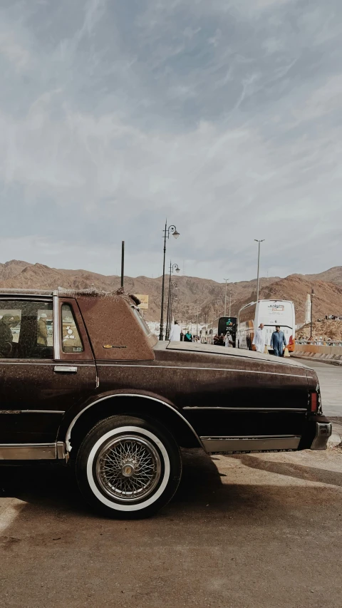 a car parked in the middle of a parking lot