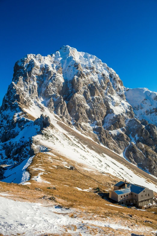 there is a large mountain covered in snow