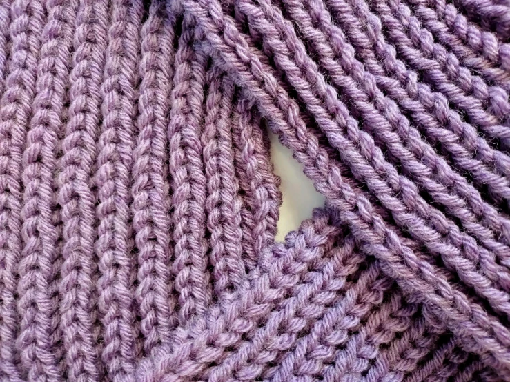 a close up s of an knitted purple cloth