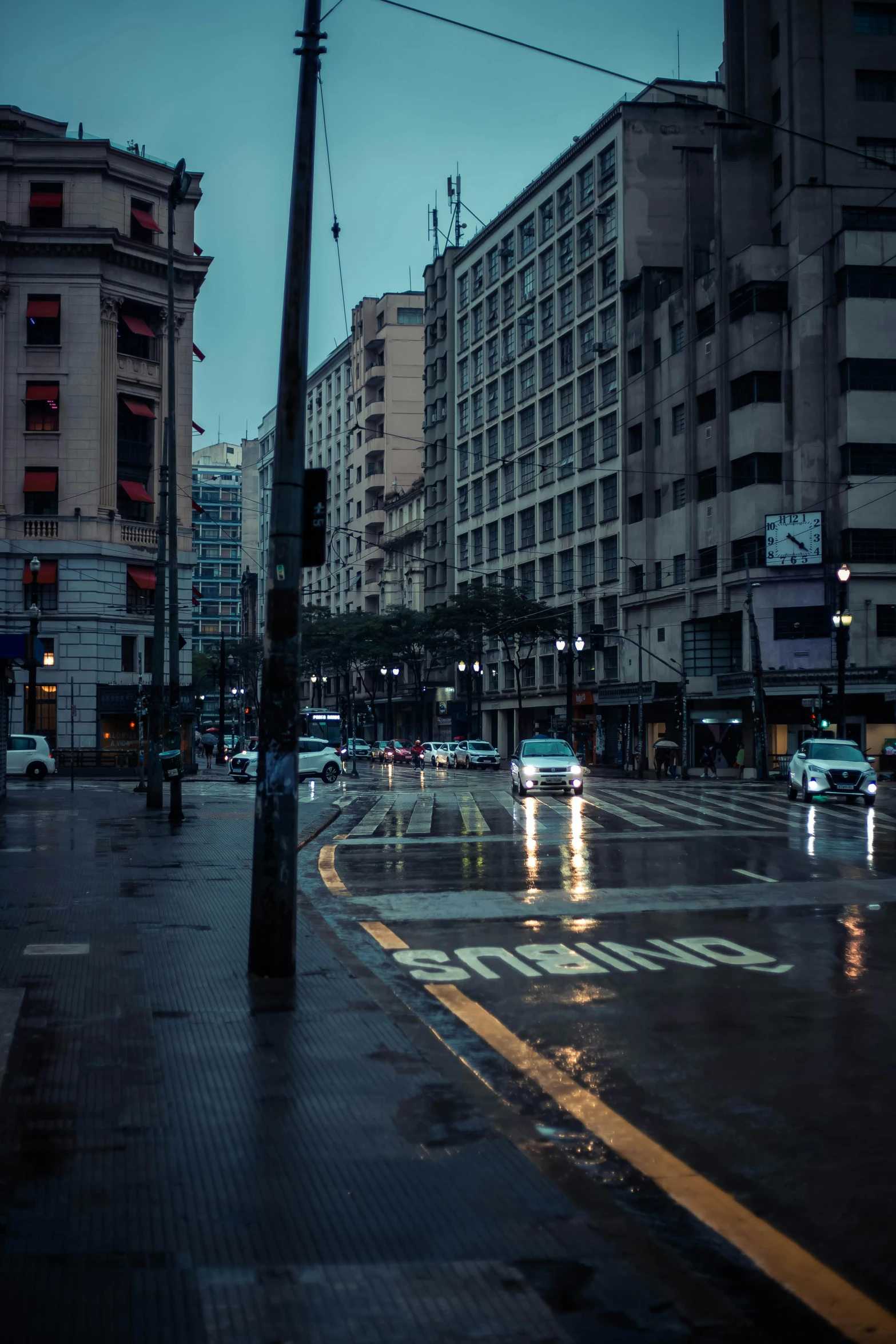 cars and a car in a busy city street