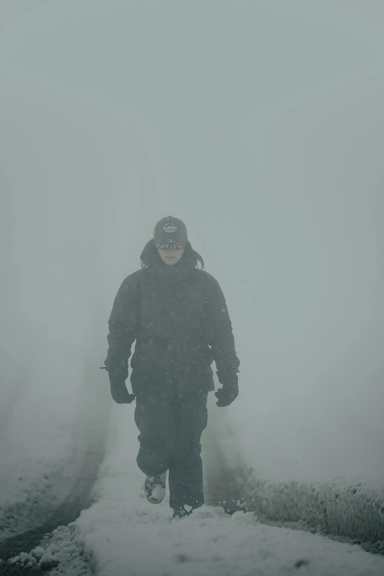 a person is walking through some snowy water