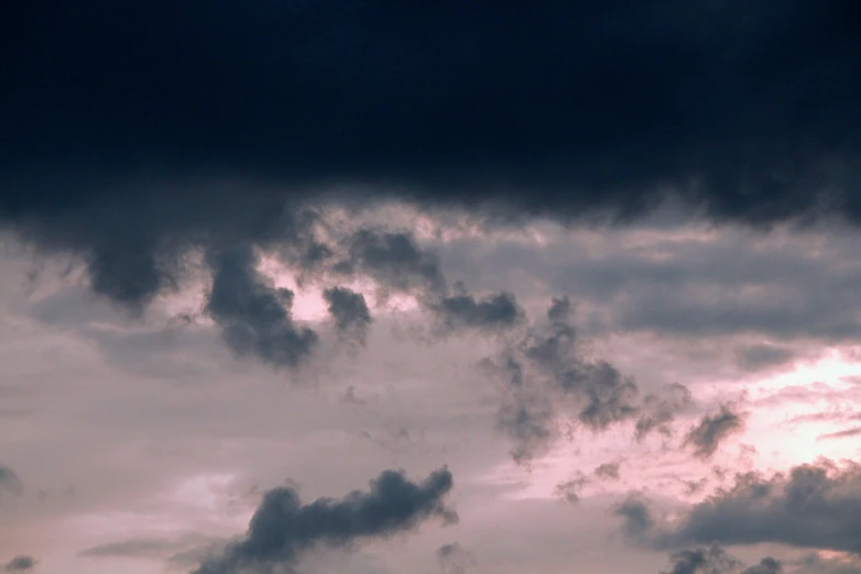 a plane flies away from the camera and appears to be approaching a landing