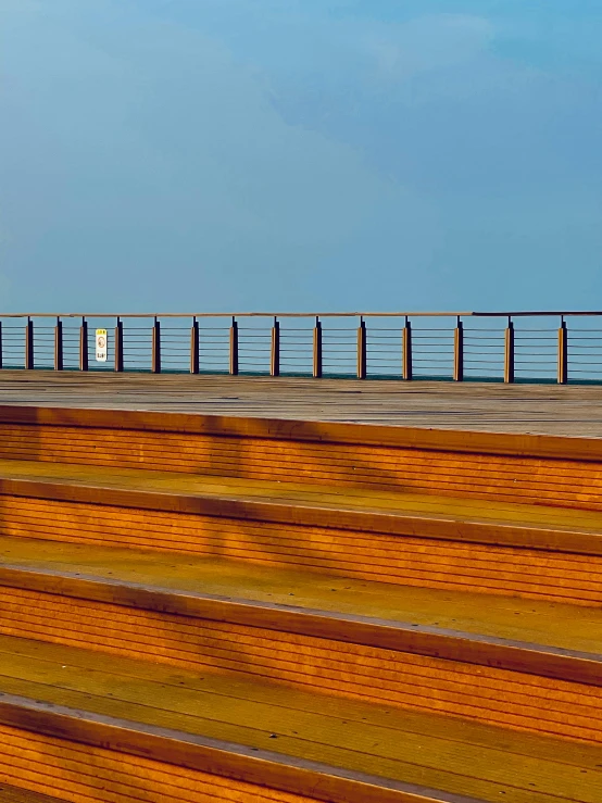 a bench by the ocean has been empty