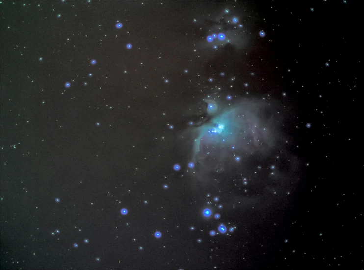 an image of a black sky with stars and dust