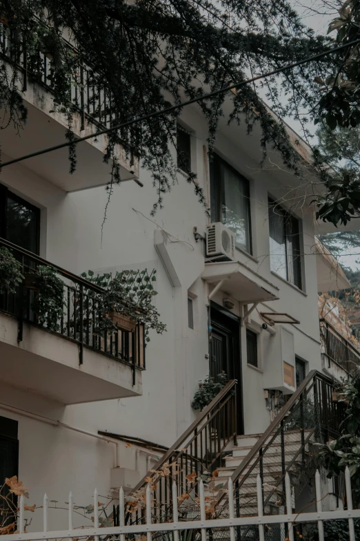 a balcony has been added to match the exterior of a house