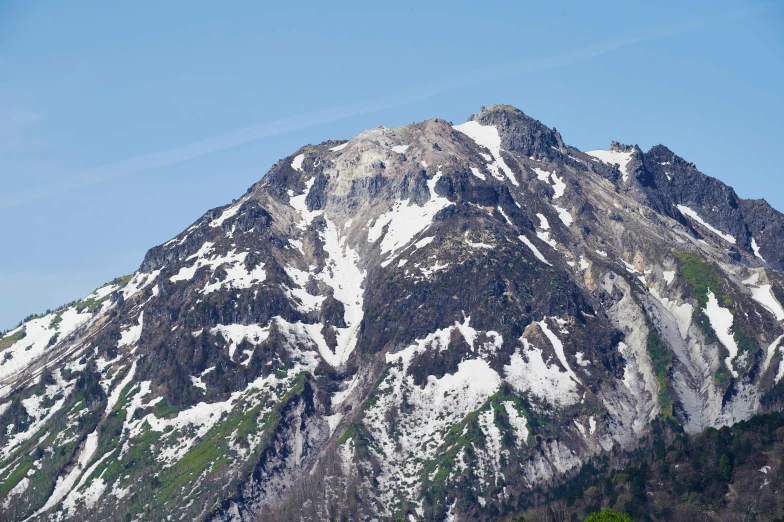 the view of the top of a mountain in the foreground