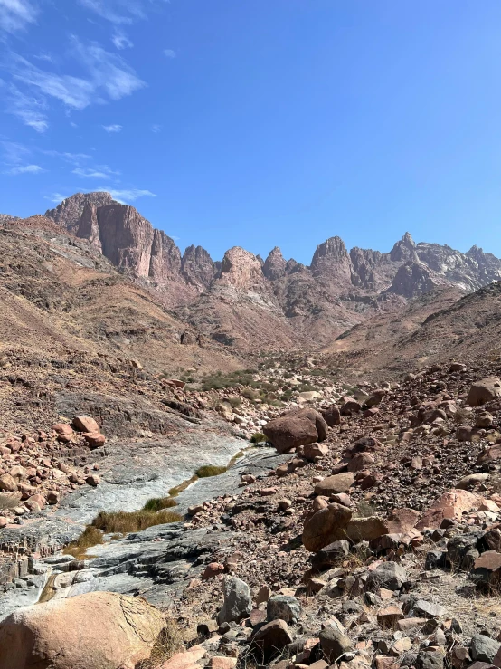 rocks, water, and other debris in the desert