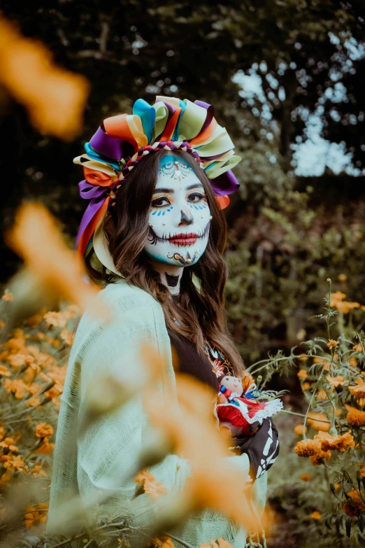 a woman with a painted face and head