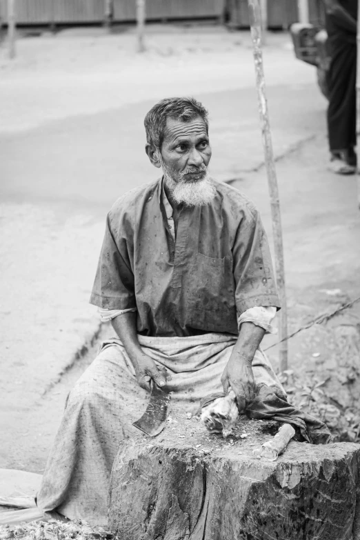 a black and white po of a man on the street
