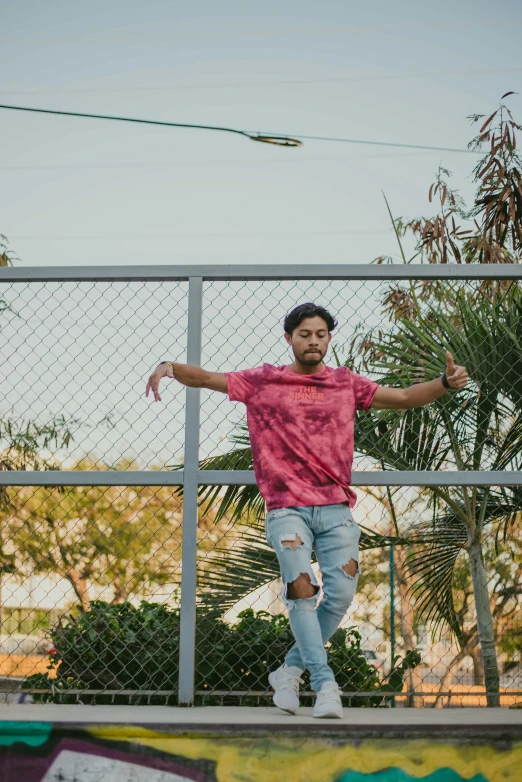 a young man doing a trick on his skateboard