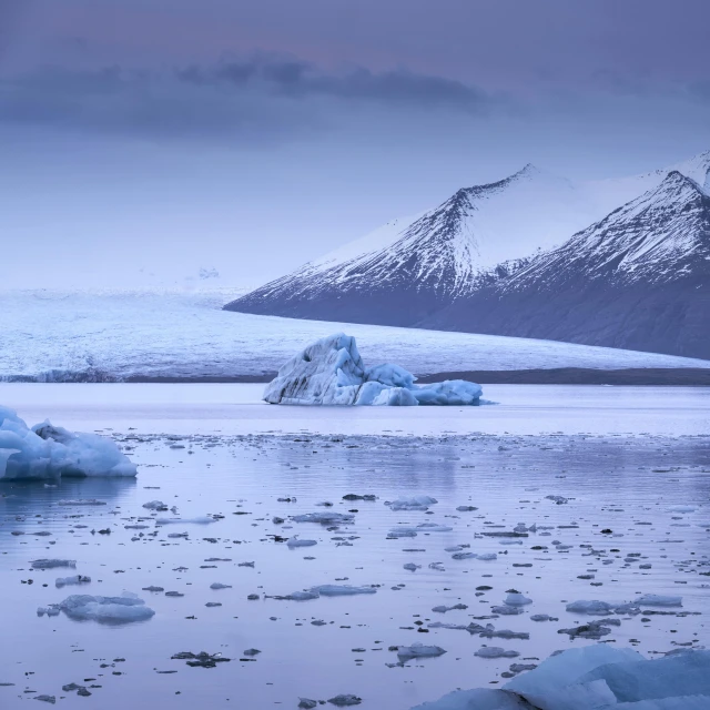 the ice in the lake looks like it is melting