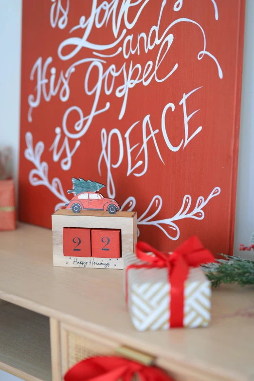 christmas decorations with gift boxes and presents on a shelf