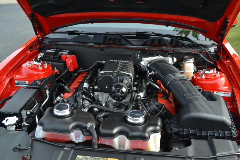 the engine of an automobile shows only on top