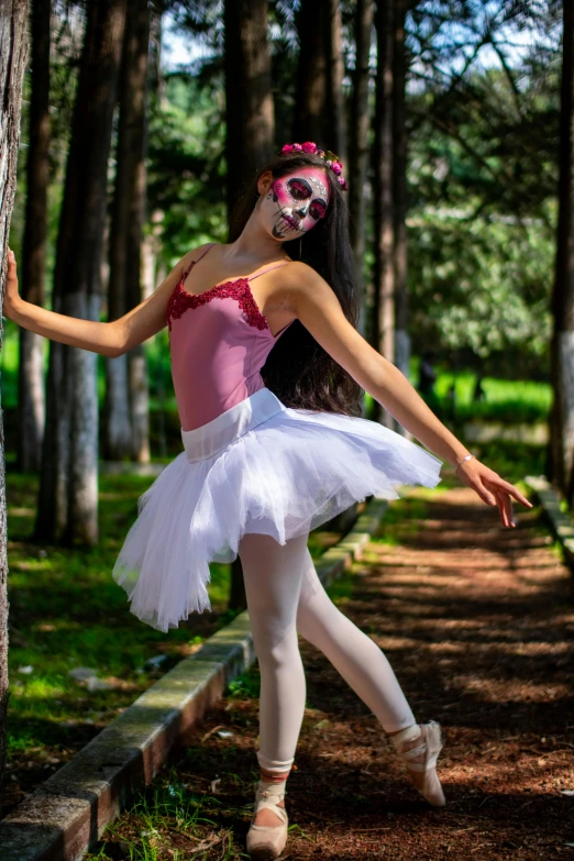 a ballerina ballet dancer poses for a po