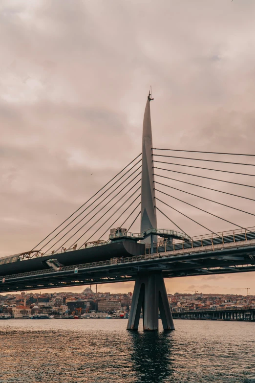 a very tall bridge spanning across a large body of water