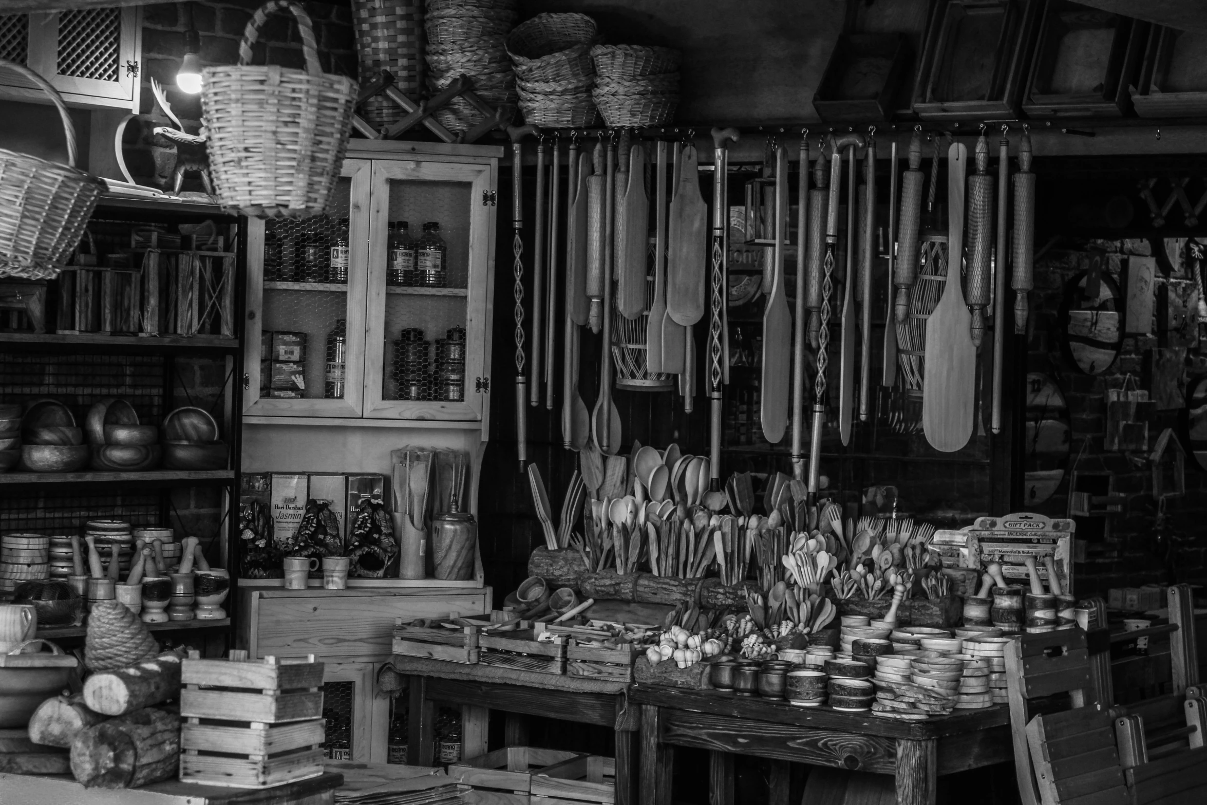 several shelves and baskets filled with goods for sale