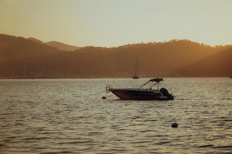 small boat in a large body of water