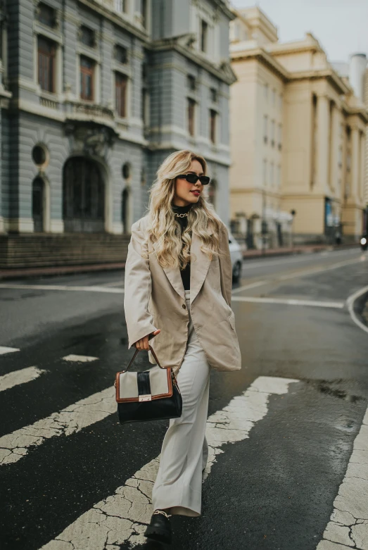 a woman on the street with a purse