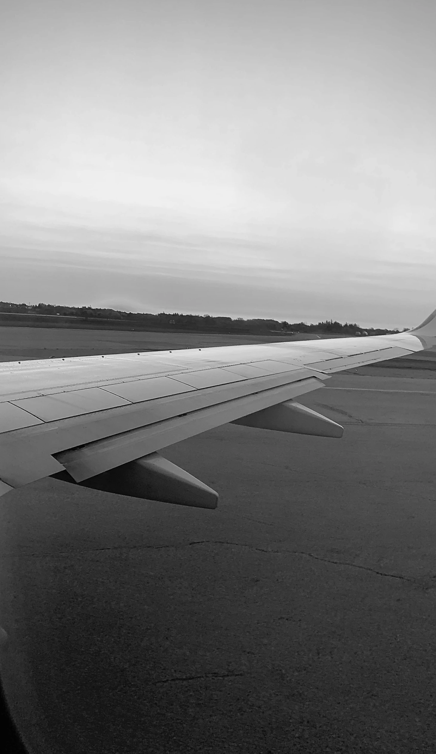 a view from the window of a plane at the airport