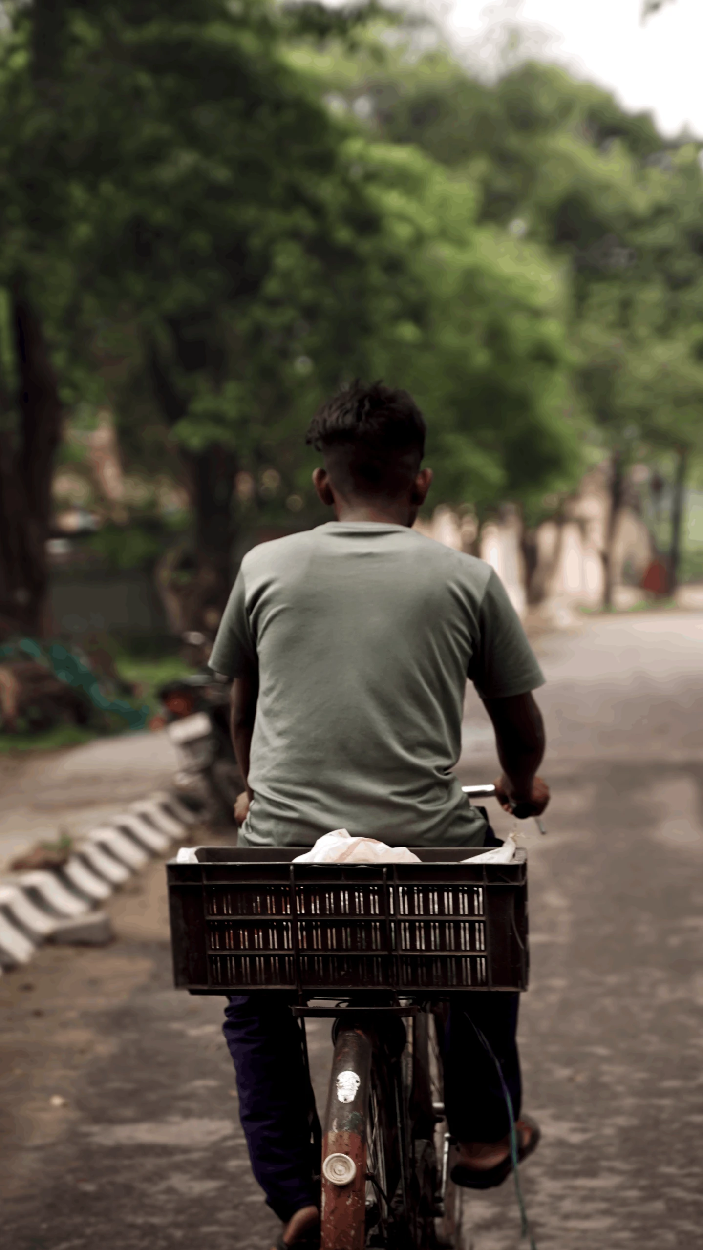 a man riding his bike on the road