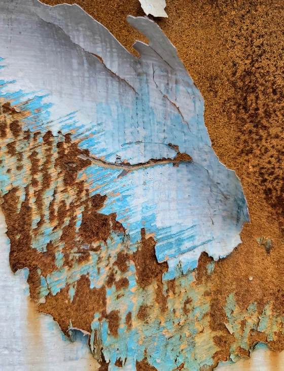 a ed surface with blue and brown paint