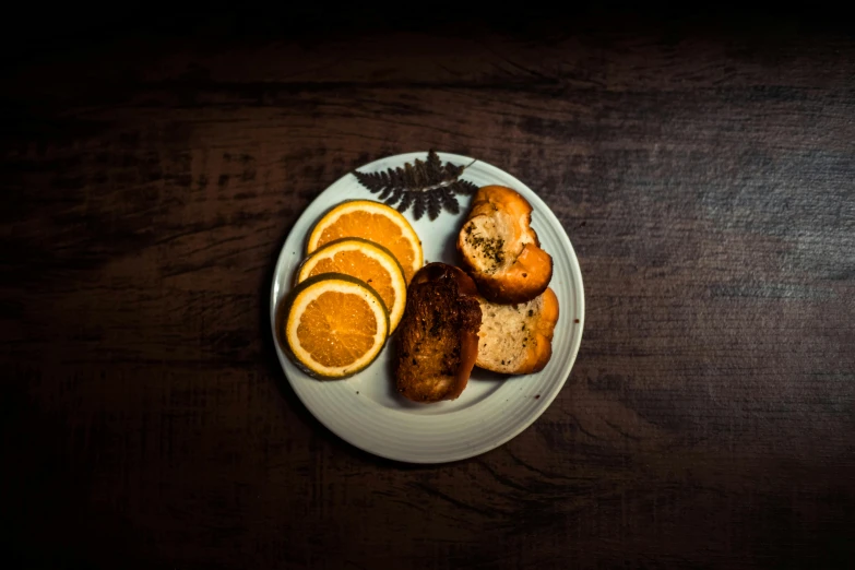 a plate of pastries is arranged on a wooden table