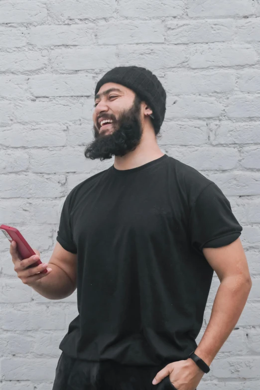 a man with a beard is looking up