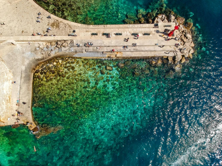 aerial view of the beach with the ocean in front