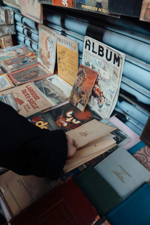 many books are stacked on top of each other