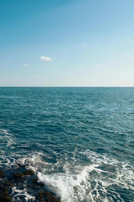 a boat traveling down a very large body of water