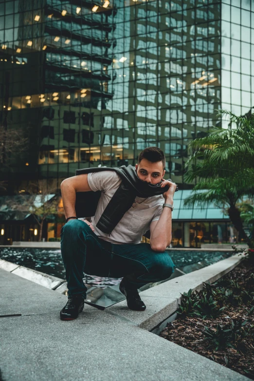 a man with a backpack is talking on a cellphone