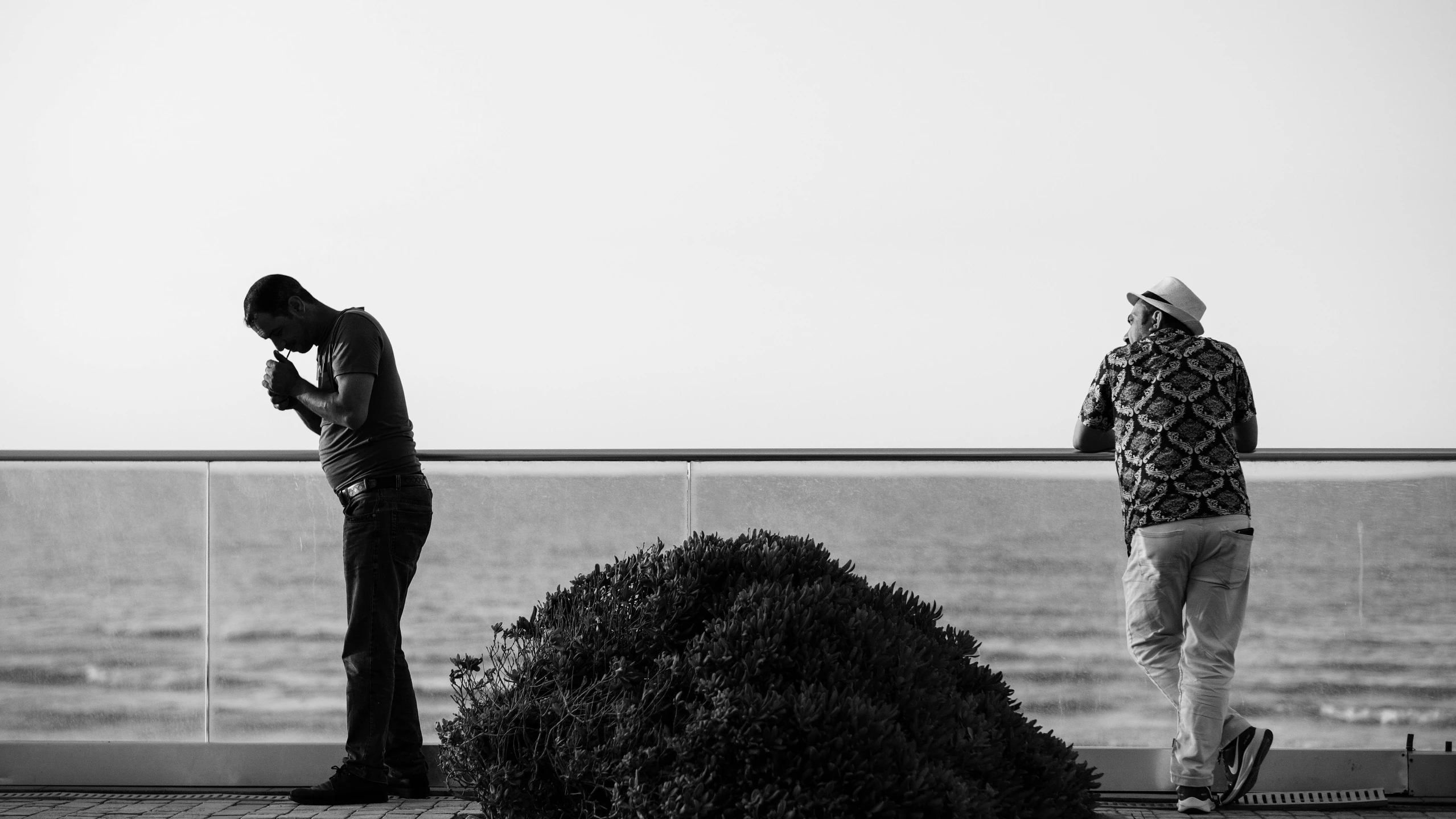 a couple of guys hanging out by the water