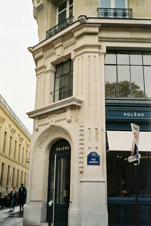 a building with an arched window in front of it