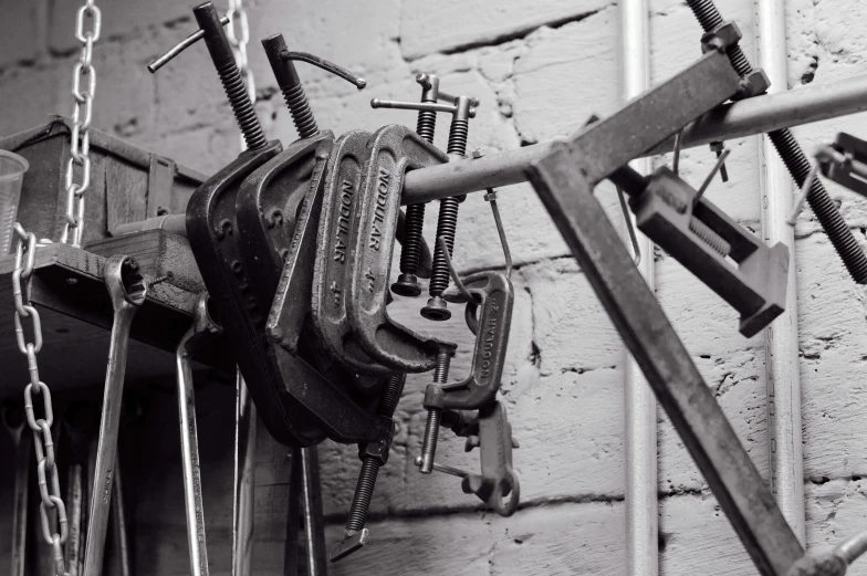 black and white pograph of a set of keys hanging from hooks