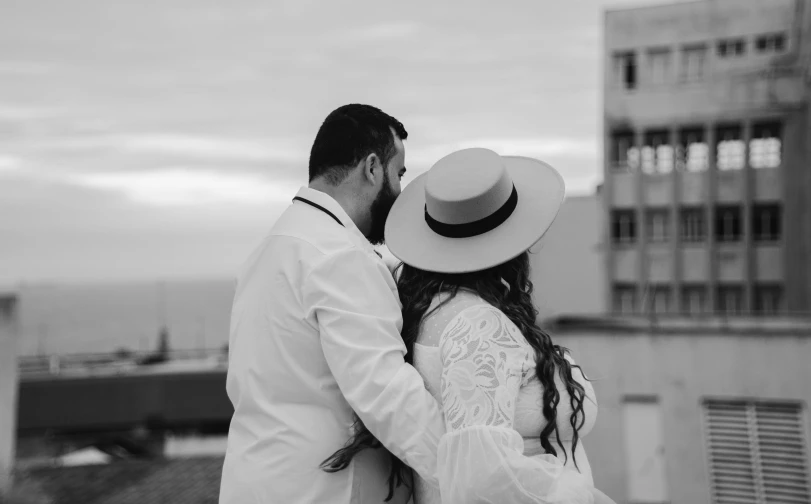 a couple is taking a moment to admire the view