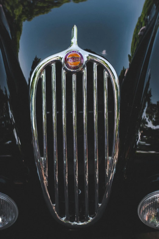 the front grills of a classic black car