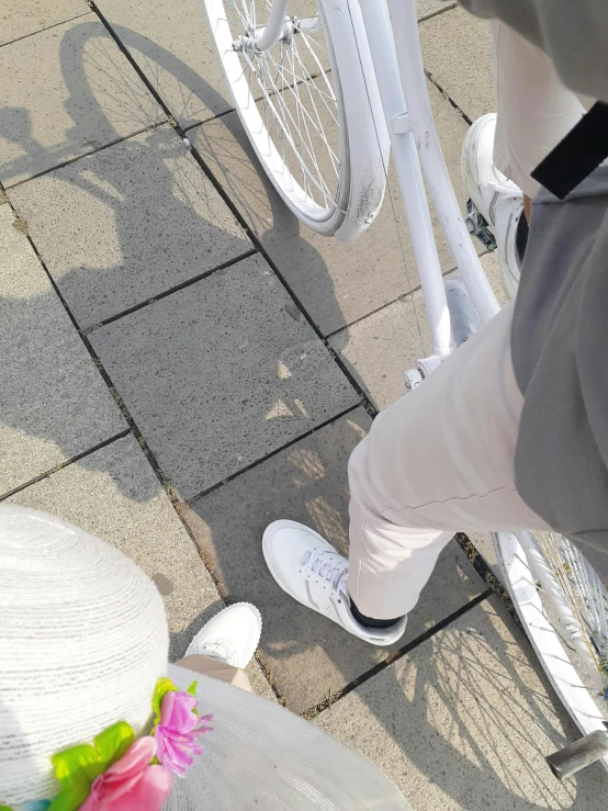 someone sitting on their bike in white socks