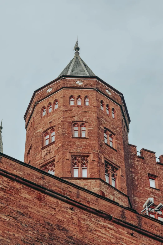 an old brick building with the top half in an upward position