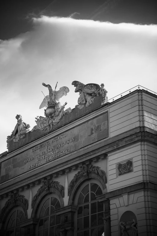 a building with some statues on top of it