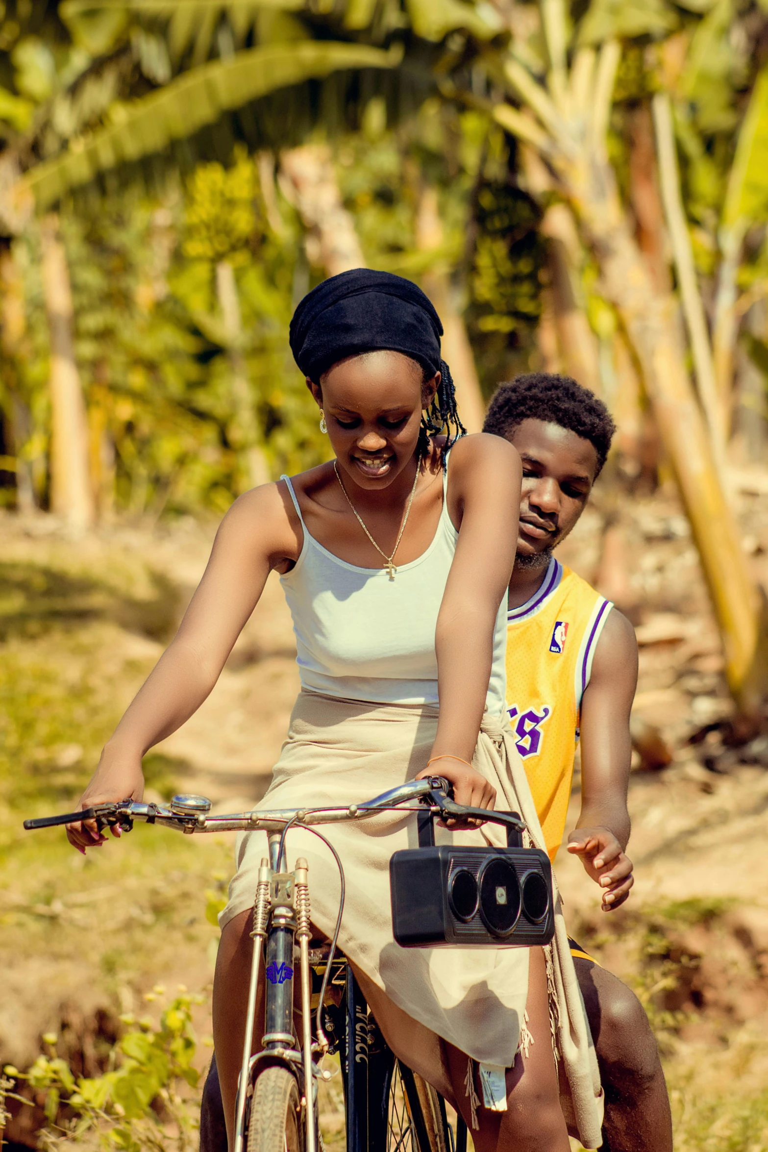 a couple of people on some kind of bike