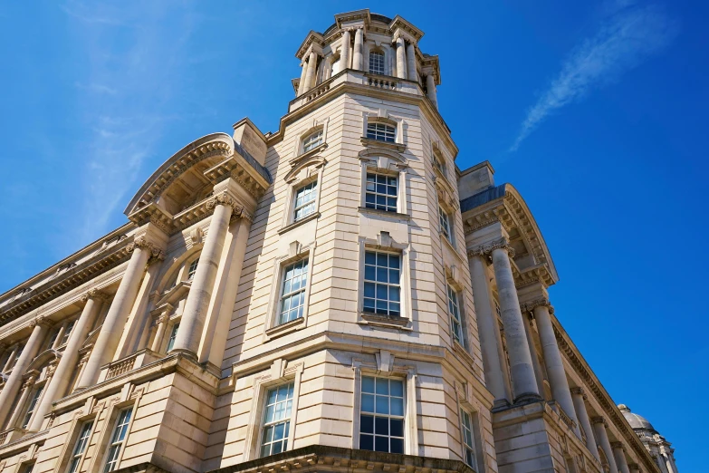 a very tall building with a clock on the top